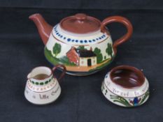 Torquay / Devon motto ware pottery; teapot, jug and sugar bowl, various marks including Aller Vale.