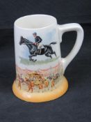 A Royal Doulton Grand National commemorative tankard.