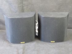 A pair of Jamo Surround 150 speakers.