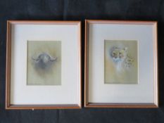 A pair of pastel sketches signed William H North being a cheetah and a bison,