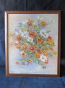 A contemporary oil still life study of flowers in reds and orange, signed Ruby L Tundin?,