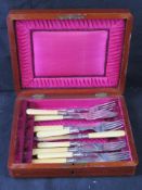 Silver plated fish knives and forks in box.