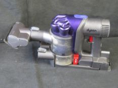 A Dyson hand held hoover. Disclaimer: electrical items are sold as untested and without guarantee.
