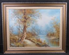 A 20th century oil painting of woodland scene, framed.