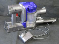 A Dyson hand held hoover. Disclaimer: electrical items are sold as untested and without guarantee.