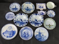 A quantity of Delft dishes, cup, ashtrays, etc.