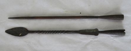 Two handmade spear tops.