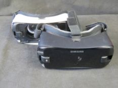 Two virtual reality headsets.