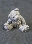 A Country Artist hallmarked silver teddy bear figure.