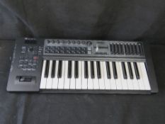 An Edirol by Roland midi keyboard controller PCR-300.