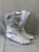 A pair of motorcycle boots, size 9.