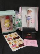 Two Madame Alexander dolls in boxes;