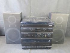 A Philips stereo system and speakers including turntable.