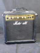 A Marshall MG15 guitar amp.