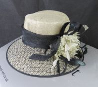 A hat for special occasions weddings / ascot etc in associated box.