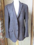 A 33% wool tweed jacket by Black Label,