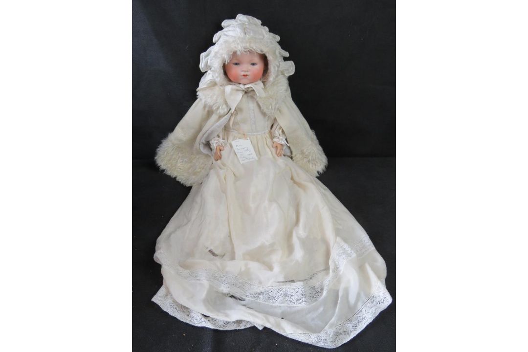 An Armand Marseilles bisque head baby doll, 3418, cloth body, sleepy eyes and closed mouth. - Image 1 of 9