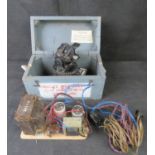 An Astro compass in box together with unknown item.