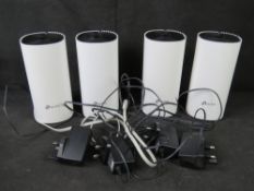 A TP LINK whole home mesh system.