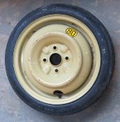 A vintage spare wheel with Yokohama tyre