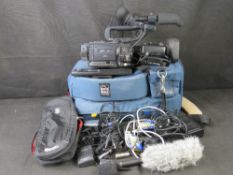 A JVC DV Camcorder with bag and accessories.