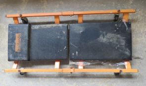 A Halfords car creeper