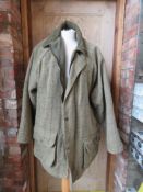 A 50% wool tweed jacket by Lavenir Outdoor Garments, size L.