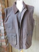 A waxed cotton gilet by PG Field, size XL.