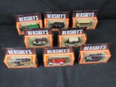 Eight Herseys die cast model vehicles.
