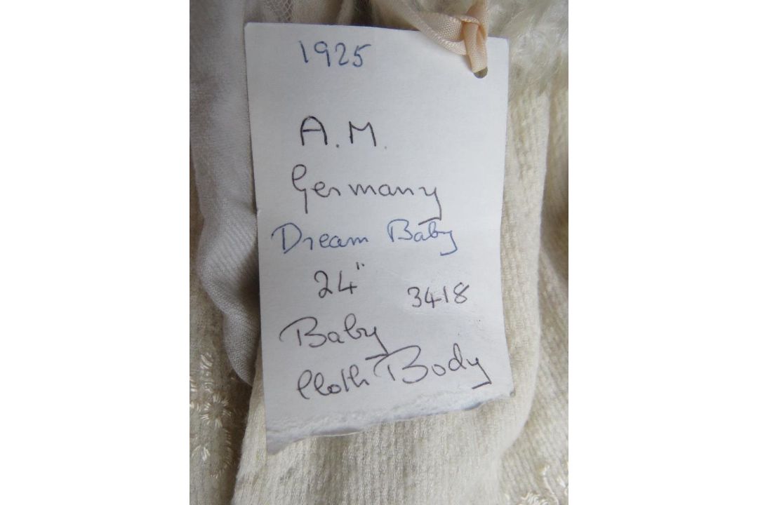 An Armand Marseilles bisque head baby doll, 3418, cloth body, sleepy eyes and closed mouth. - Image 9 of 9