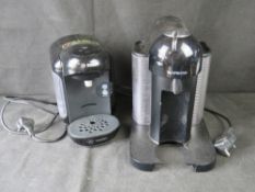 A Nespresso and a Tassimo/Bosch coffee machine.
