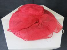 A hat for special occasions weddings / ascot etc in associated box.