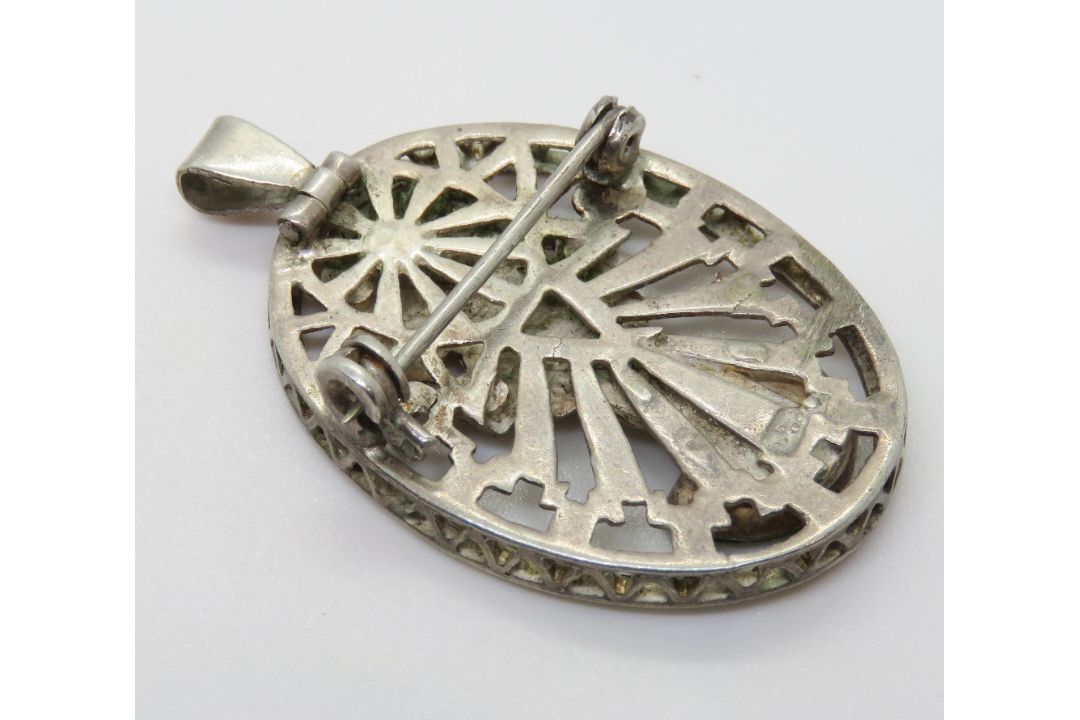A Mexican silver brooch or pendant in Aztec style with green stone upon. - Image 2 of 2