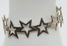 A 925 silver stars bangle.