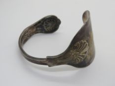 A silver plated spoon bangle.