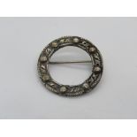 A silver Celtic style wreath brooch hallmarked for Chester.