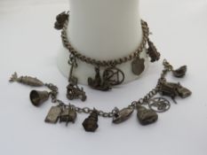 A silver charm bracelet together with another without clasp. Two items, total weight 39.7g.