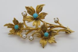 A 9ct gold turquoise and seed pearl floral brooch, hallmarked 375, 6.1g.