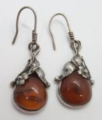 A pair of silver and Baltic amber earrings, approx 5cm inc hanger.