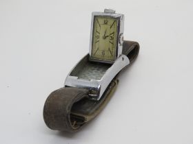 An early 20th century hidden dial wristwatch,