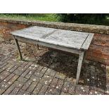 A wooden garden table, 160 x 80cm.
