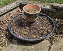 A chicken feeder repurposed as a planter, 75cm dia.
