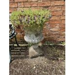 An urn shaped garden planter, 52cm dia, 65cm high.