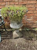 An urn shaped garden planter, 52cm dia, 65cm high.