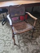 A bergère chair, cane seat a/f.