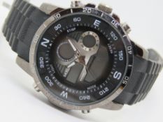 A Skyline wristwatch, stainless steel with rubber strap.