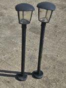 A pair of garden lights, 96cm tall.
