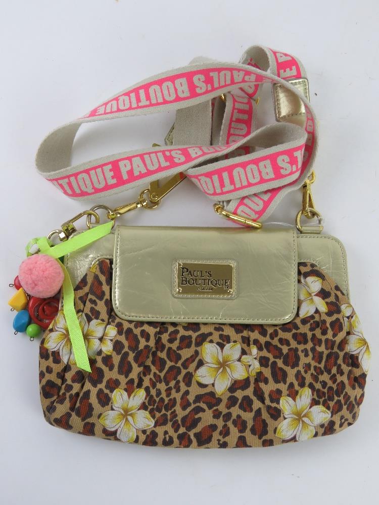 A Paul's Boutique leopard print and floral pattern handbag approx 24cm wide.