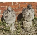 A pair of cast eagle garden statues.