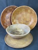 A fine wooden fruit bowl, 40cm dia, together with two large bowls and a platter.